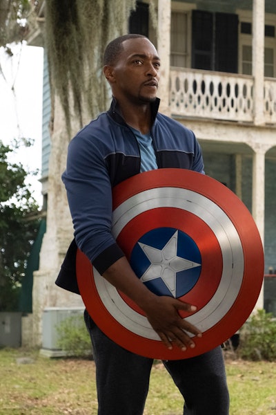 Anthony Mackie holding a Captain America shield