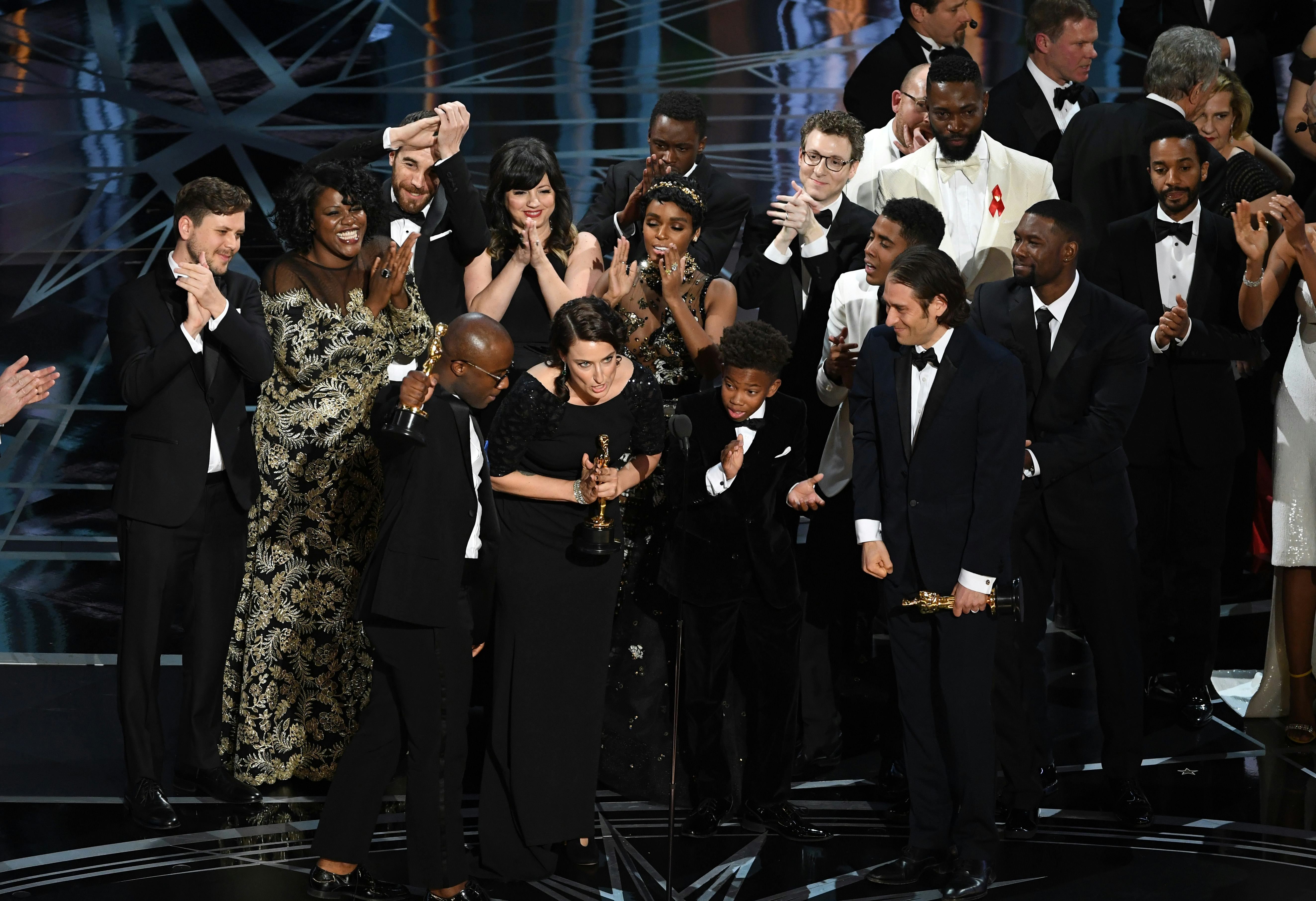The cast and crew of 'Moonlight' accept the Best Picture award.