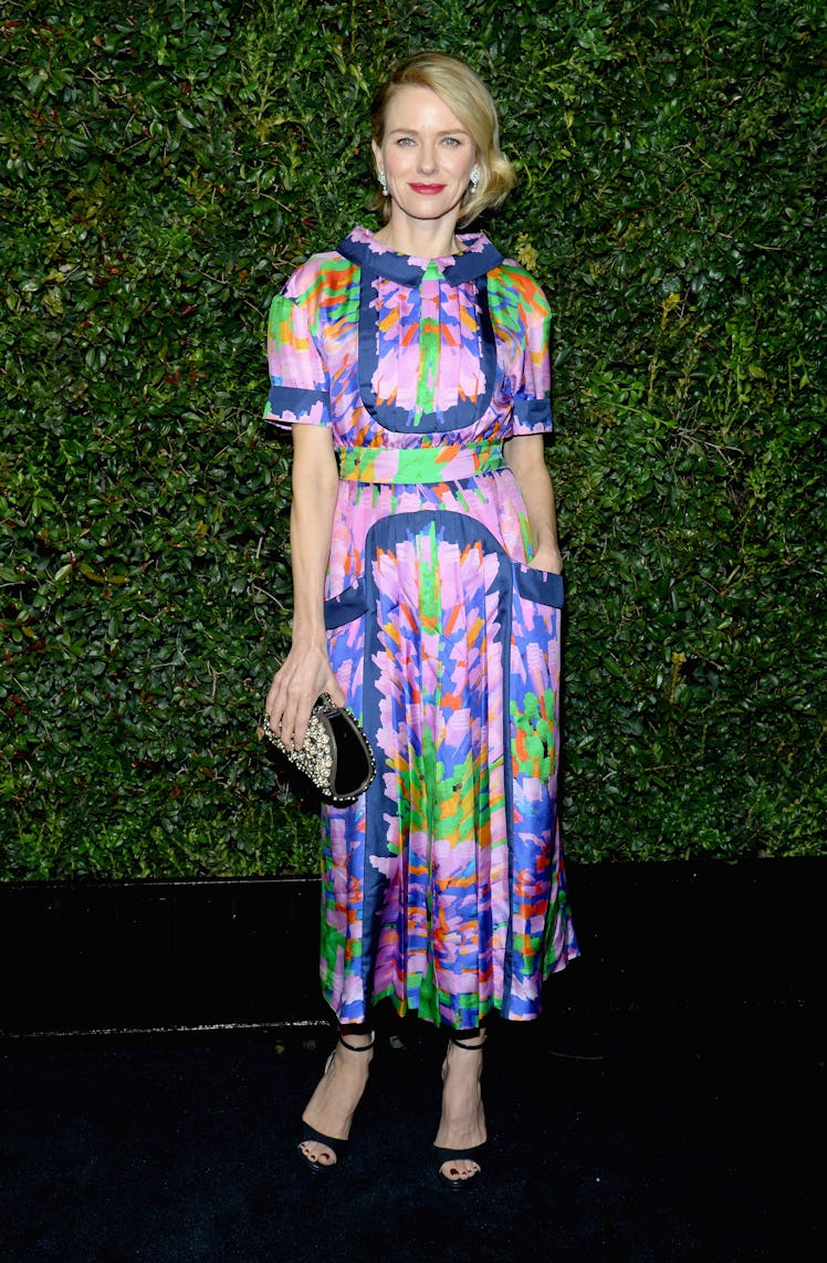 Naomi Watts in a multi-colored floral dress at Chanel’s Pre-Oscars Dinner