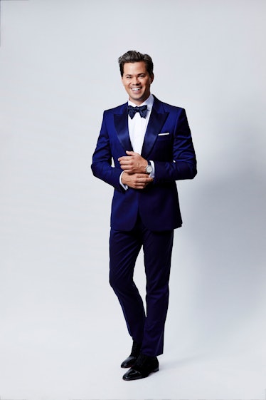 Andrew Rannells in a formal suit with a bow tie 