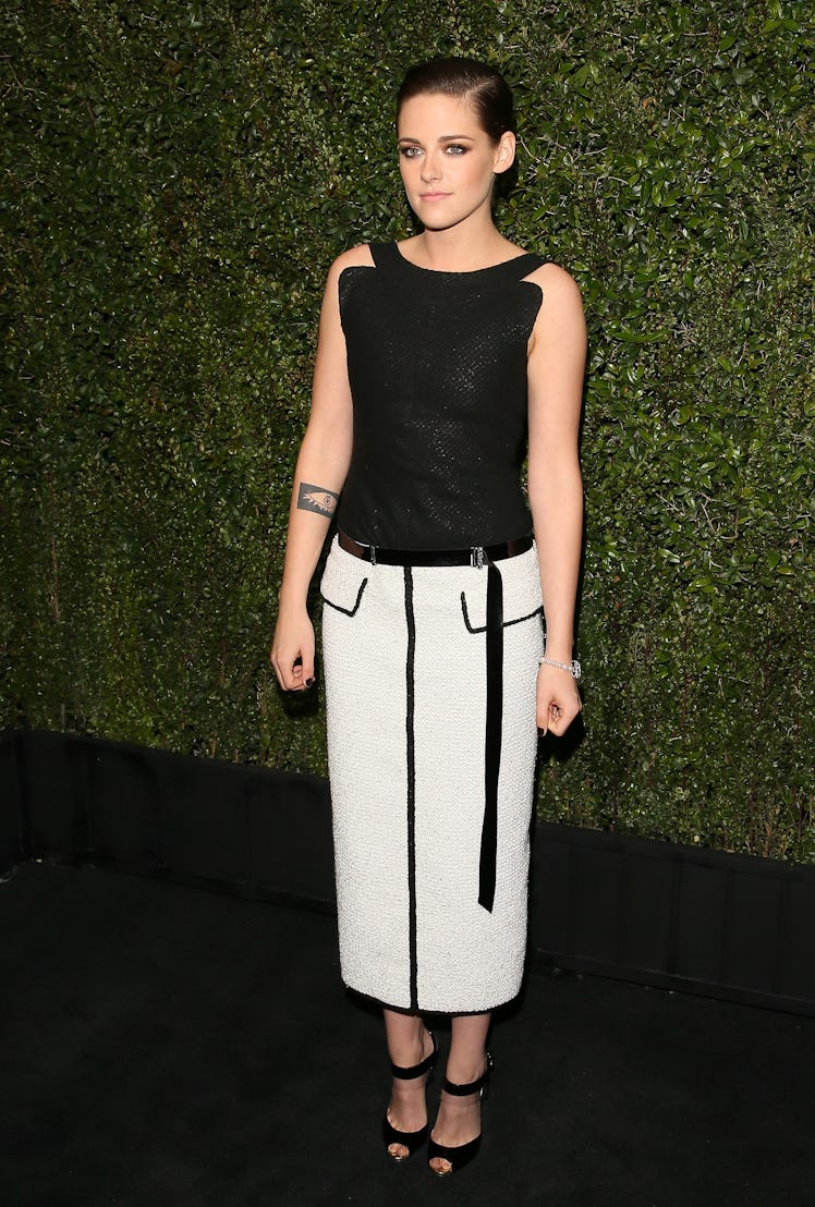 Kristen Stewart in a black-white dress at Chanel’s Pre-Oscars Dinner