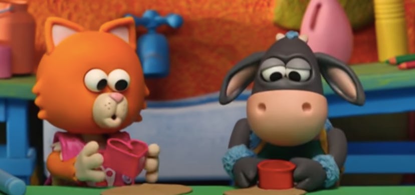 Cat and donkey sit together in the toddler show 'Timmy Time'