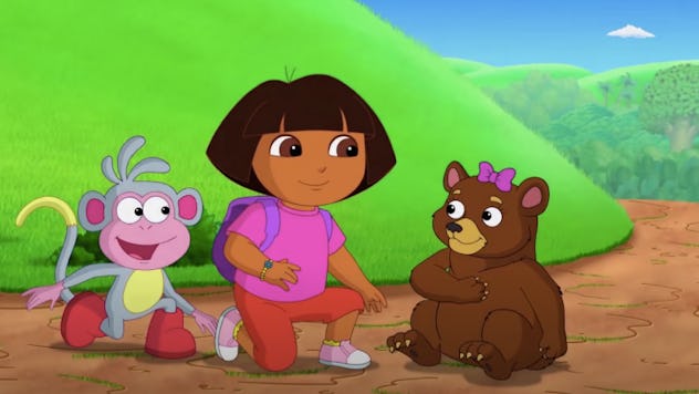 Dora and Boots sit with a bear in 'Dora the Explorer'