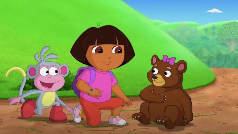 Dora and Boots sit with a bear in 'Dora the Explorer'