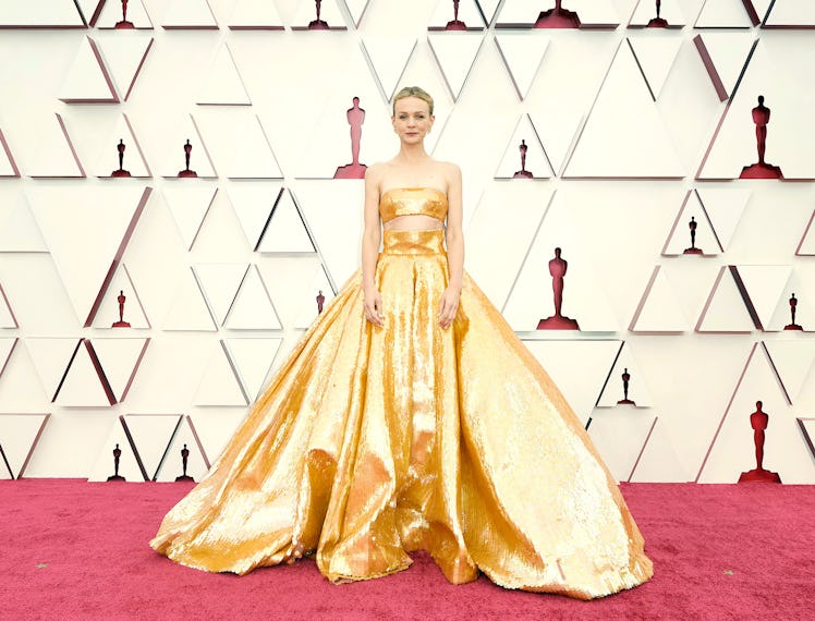 Carey Mulligan wearing a gold dress