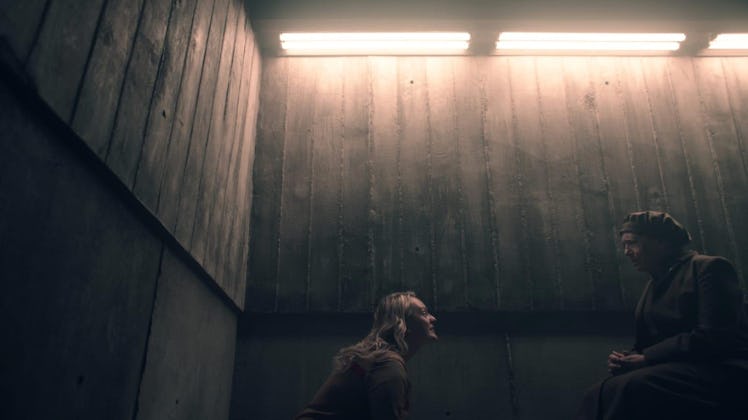 Elisabeth Moss as June and Ann Dowd as Aunt Lydia in The Handmaid's Tale