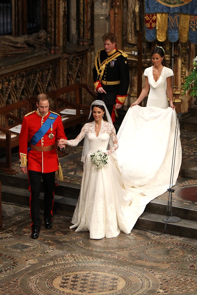 TRH Prince William, Duke of Cambridge and his new bride Catherine, Duchess of Cambridge walk down th...