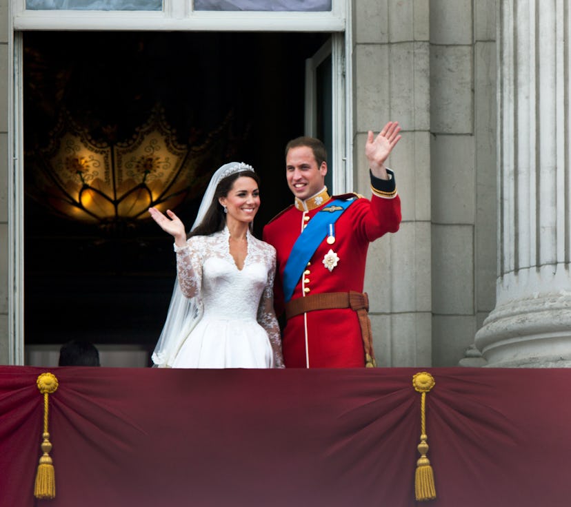 Prince William and Catherine, Duchess of Cambridge greet well-wishers from the balcony at Buckingham...