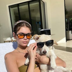 Kaia Gerber in Lexxola's Damien Sunglasses in orange.