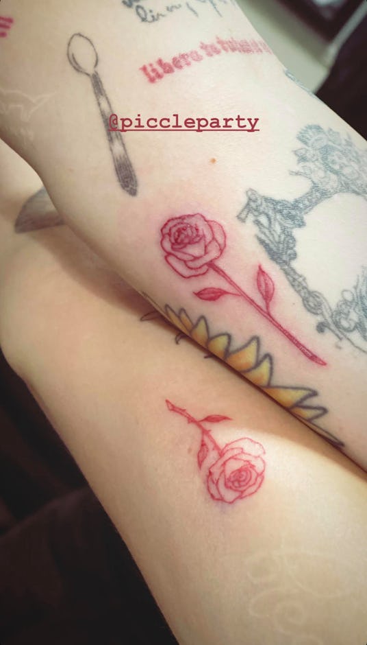 Paris Jackson Cara Delevingne matching rose tattoos