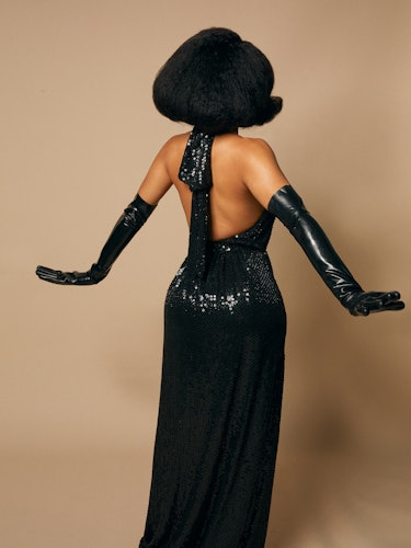 Saweetie in black Celine by Hedi Slimane dress