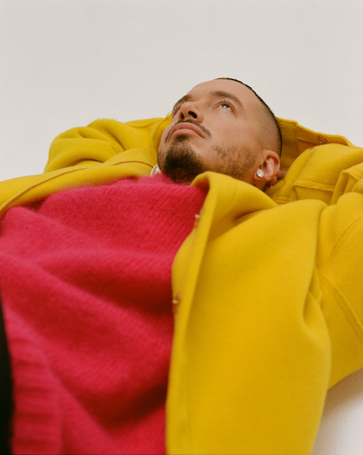 J Balvin in a Raf Simons jacket and sweater.
