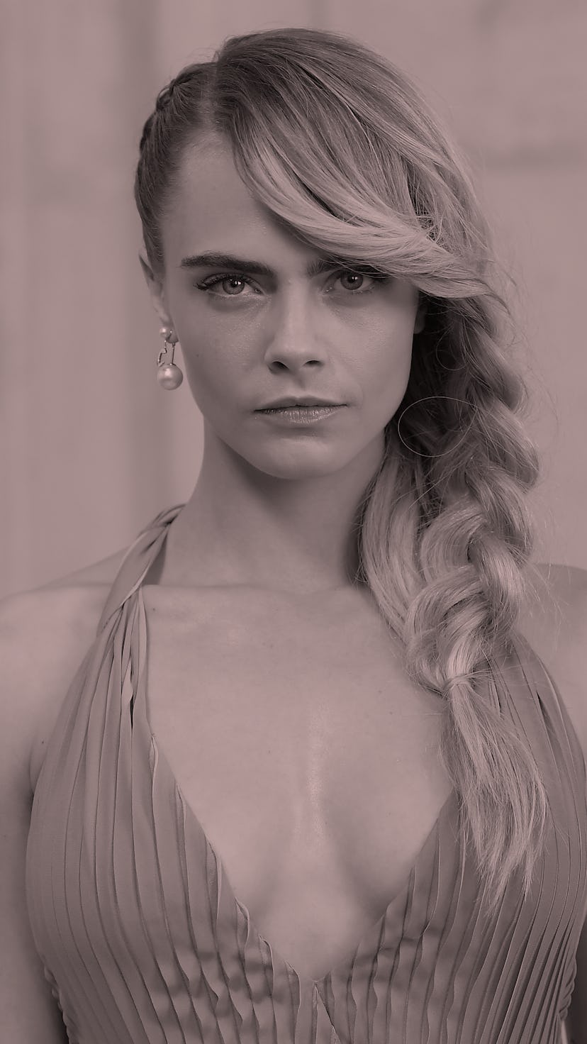 Cara Delevingne attends the Christian Dior show as part of the Paris Fashion Week Womenswear Fall/Wi...