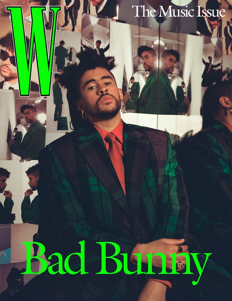 Bad Bunny wears a Louis Vuitton Men’s jacket, shirt, skirt, and tie; rings: (from top) Vitaly, Jewel...