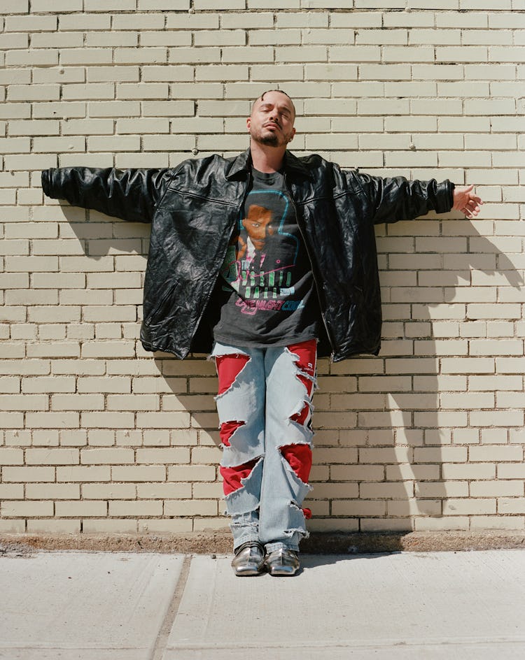 J Balvin in a Balenciaga jacket, jeans, and shoes; his own T-shirt.