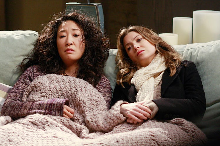 Sandra Oh as Cristina Yang and Meredith Grey as Meredith Grey in Grey's Anatomy.