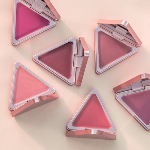 photo of six LYS Beauty high standard matte satin cream blushes on a peach background