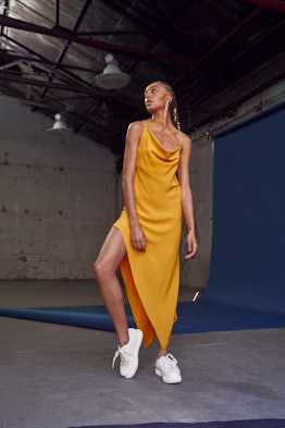 Runway/lookbook image of Monse's Criss Cross Slip Dress from the brand's Spring/Summer 2021 collecti...