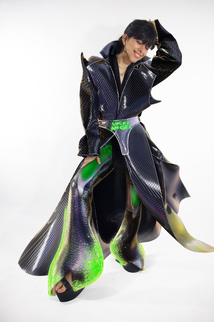 Agus wearing Tribute Brand's FIDO pants and LUCKY ANGEL coat