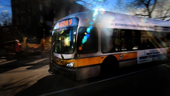 A public transit vehicle driving during the pandemic