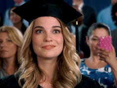 Alexis Rose sits at her graduation ceremony in an episode of 'Schitt's Creek.'