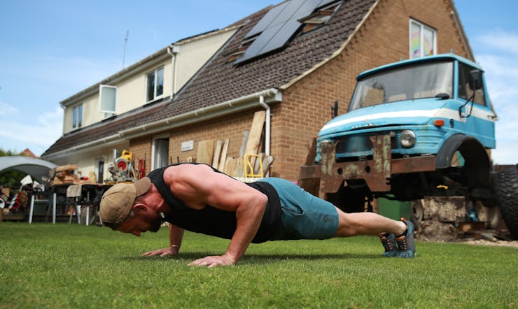 Tom Wood, the Northampton Saints and England back row forward, does pushups.