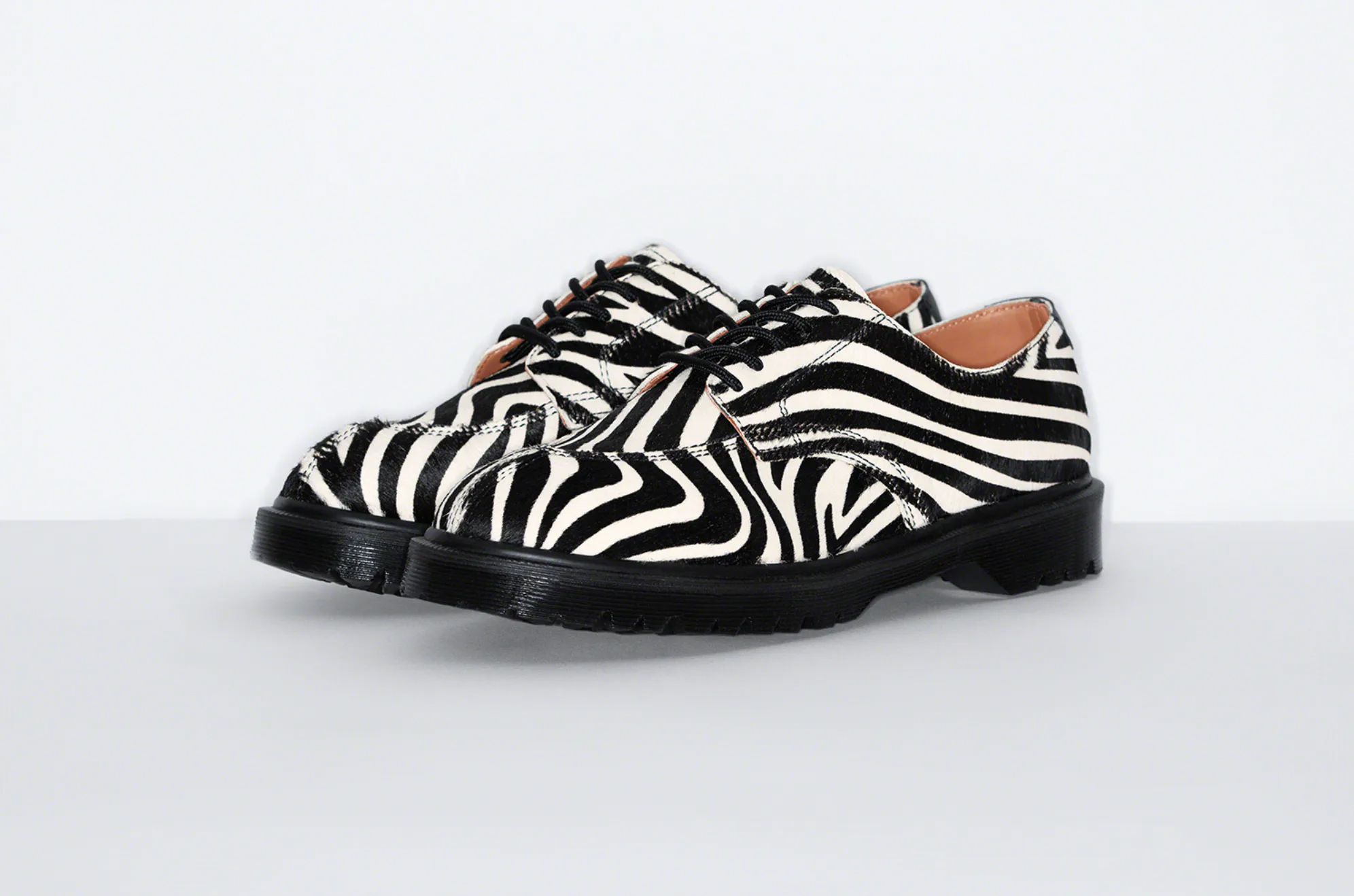 Supreme and Dr. Martens mix funk and punk to create the perfect