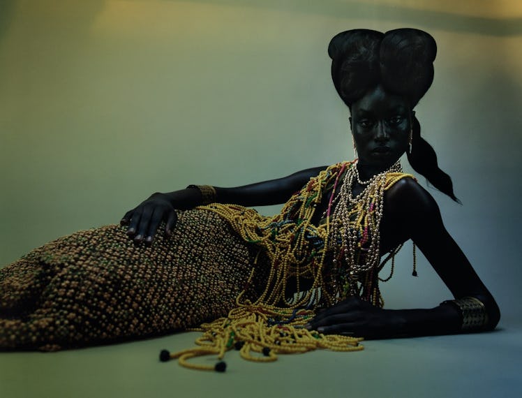 Ruea wears a Lou de Bètoly beaded dress; Jacquemus skirt; Van Cleef & Arpels earrings; Chanel neckla...