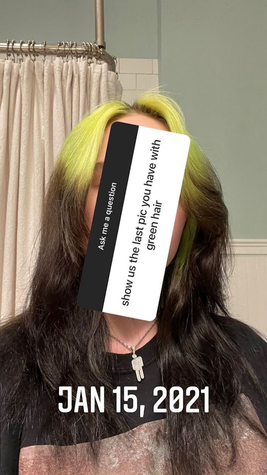 Billie Eilish poses with the last photo of her black and green hair from January 15, 2021
