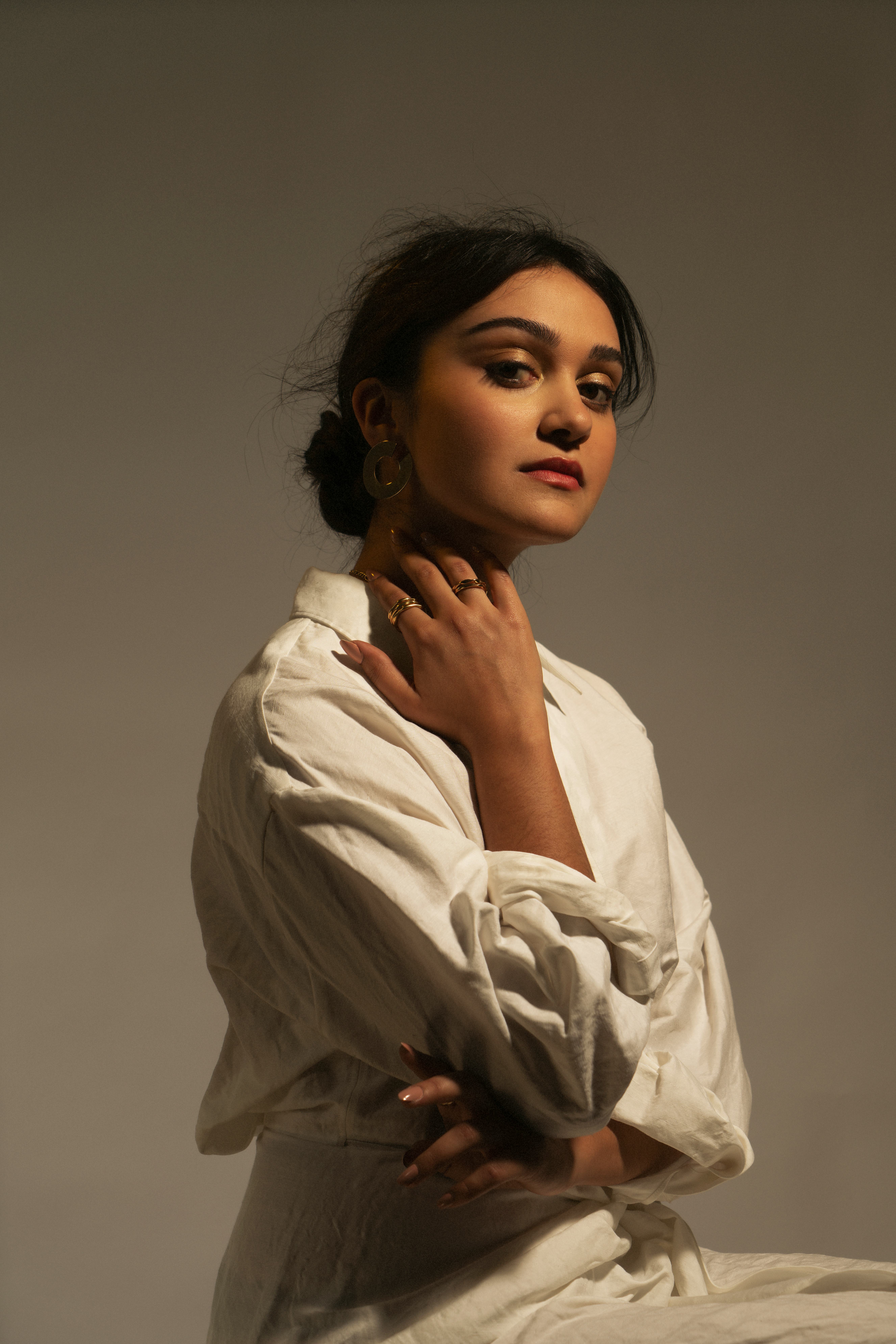 Ariela Barer in a white outfit