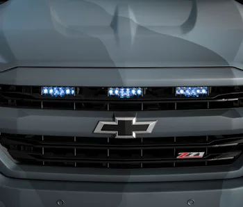 the grill of a silverado