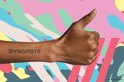 An arm making a thumbs up shows the word Dynamite on it, which was created using the Inkbox BTS temp...