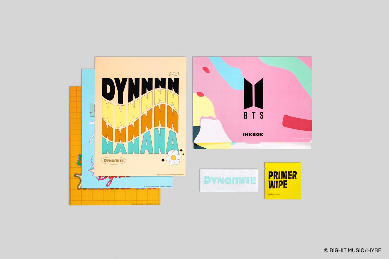 A collection of square packages from the BTS x Inkbox temporary tattoo collection