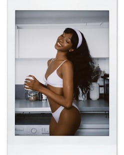 Influencer Emmanuelle Koffi wears a French bikini style from Etam, made from organic cotton.