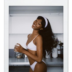 Influencer Emmanuelle Koffi wears a French bikini style from Etam, made from organic cotton.