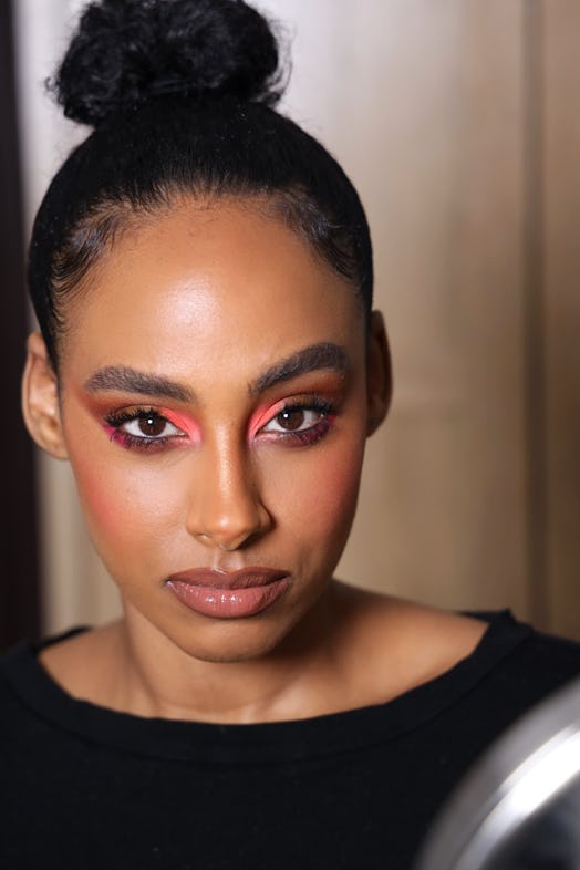 Delina Medhin's colorful eyeshadow makeup look perfect for dark skin tone