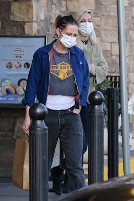 Actress Kristen Stewart rocks a Beastie Boys tee for a trip to the grocery store with her girlfriend...