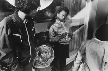 A boy photographed by Dawoud Bey