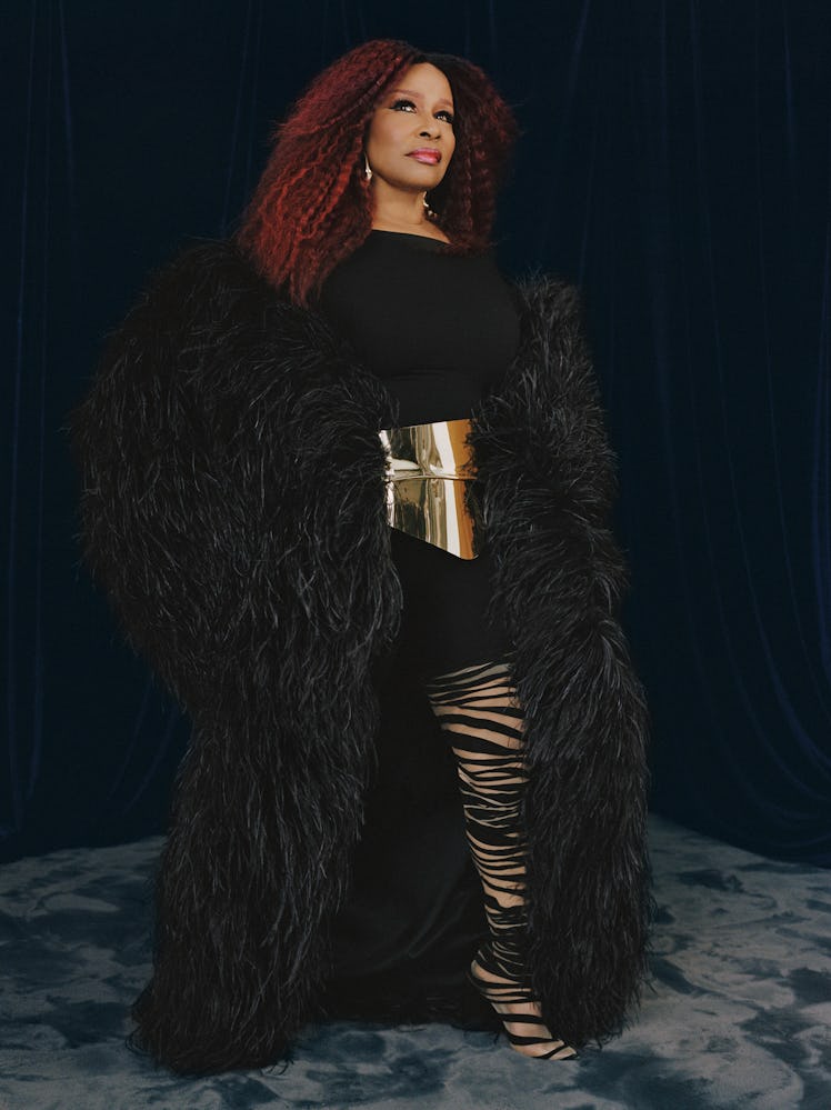 Chaka Khan wears a Lever Couture cape from Albright Fashion Library LA; Naked Wardrobe romper; Graha...