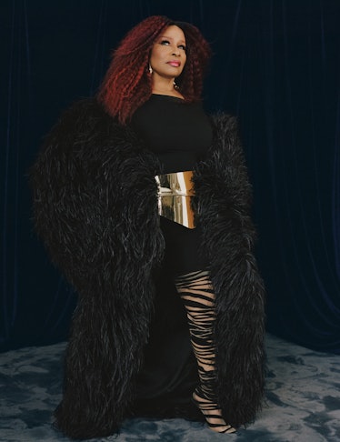 Chaka Khan wears a Lever Couture cape from Albright Fashion Library LA; Naked Wardrobe romper; Graha...