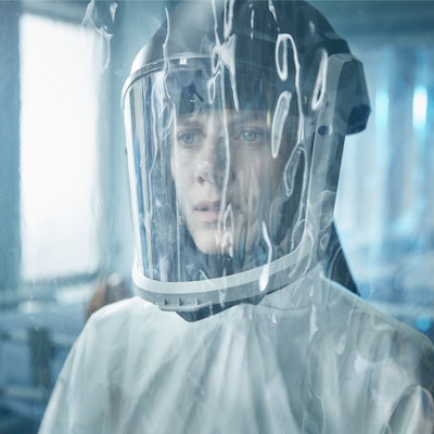 Mélanie Laurent wearing a white Covid-19 protective suit in Netflix’s Oxygen