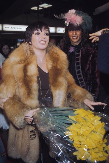 Liza wearing fur coat
