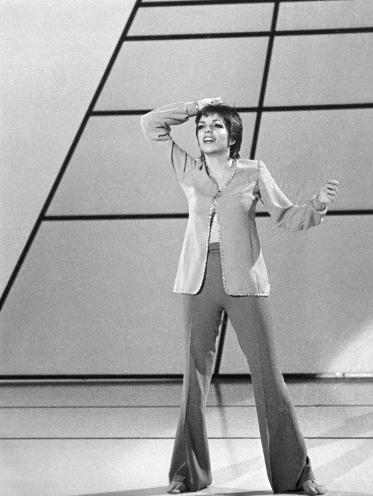 Liza wearing bell bottoms on stage