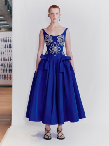 model in blue Alexander McQueen dress