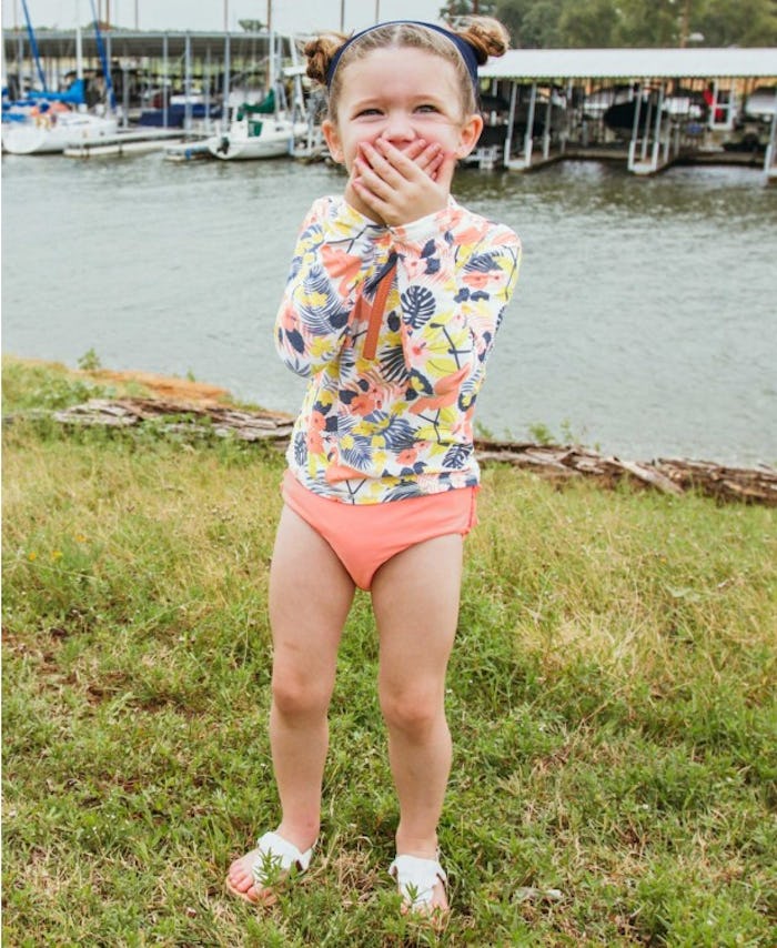 toddler girl in a bathing suit