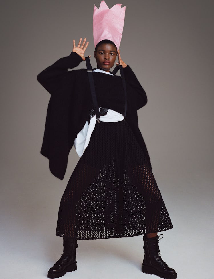 Model Anya Ekung wears a Valentino sweater and skirt; MSGM x the Perfect Magazine T-shirt; Ru Yenn h...