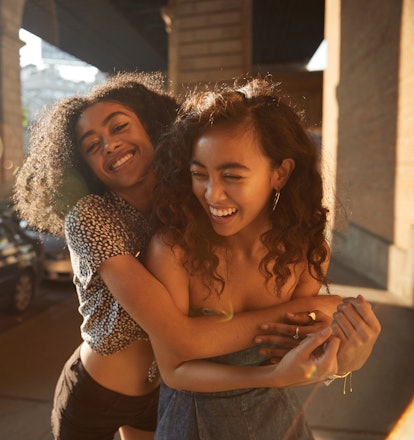 Young female best friends with compatible astrological qualities