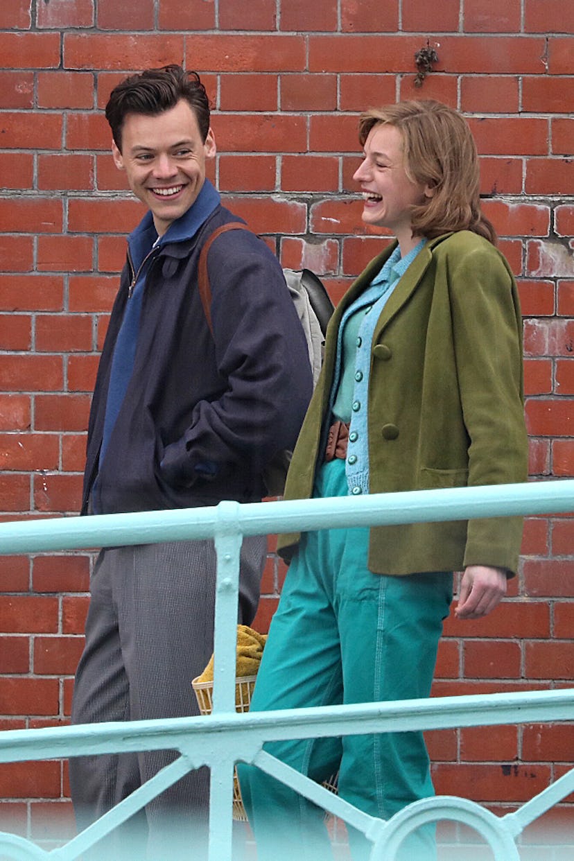 Harry Styles and Emma Corrin laughing on the set of My Policeman