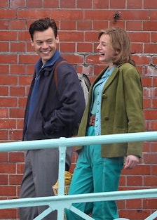Harry Styles and Emma Corrin laughing on the set of My Policeman