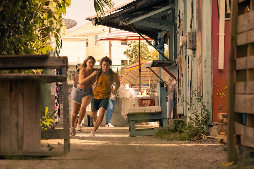 Sarah and John B. are on the run in the Bahamas in Season 2 of 'Outer Banks.' Photo via Netflix